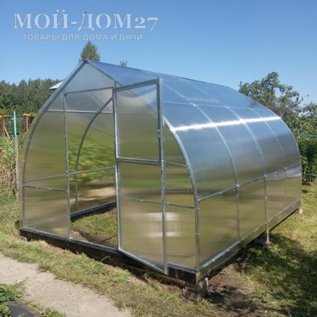 Теплица Дачница Остроконечная 4 метра с поликарбонатом | Мой-Дом27 | Каркас изготовлен из оцинкованной замкнутой трубы 30*20 мм.<br>
 Ширина - 3 метра. Высота - 2,2 метра. Длина 4 метра. <br>
 Выдерживаемая снеговая нагрузка - 80 кг/м2. Выдерживаемая ветровая нагрузка - до 15 м/с. <br>
 Расстояние между дугами 1 метр. Толщина металла 1 мм. <b>Форма - капелька</b><br>